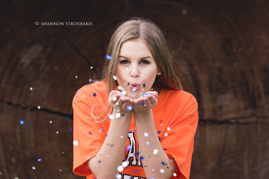 blowing glitter portraits for graduation of high school