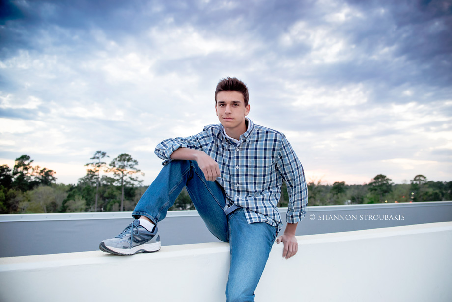 senior pictures for a woodlands high school senior in the woodlands on a rooftop