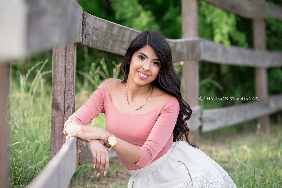 senior pictures in a field the woodlands